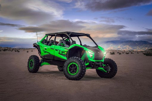 Three-quarter front angle of a side x side parked off-road. opens in a new window