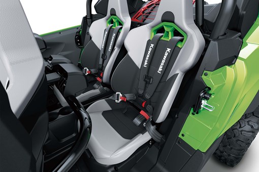 Front seats in a side x side in a white studio background. opens in a new window