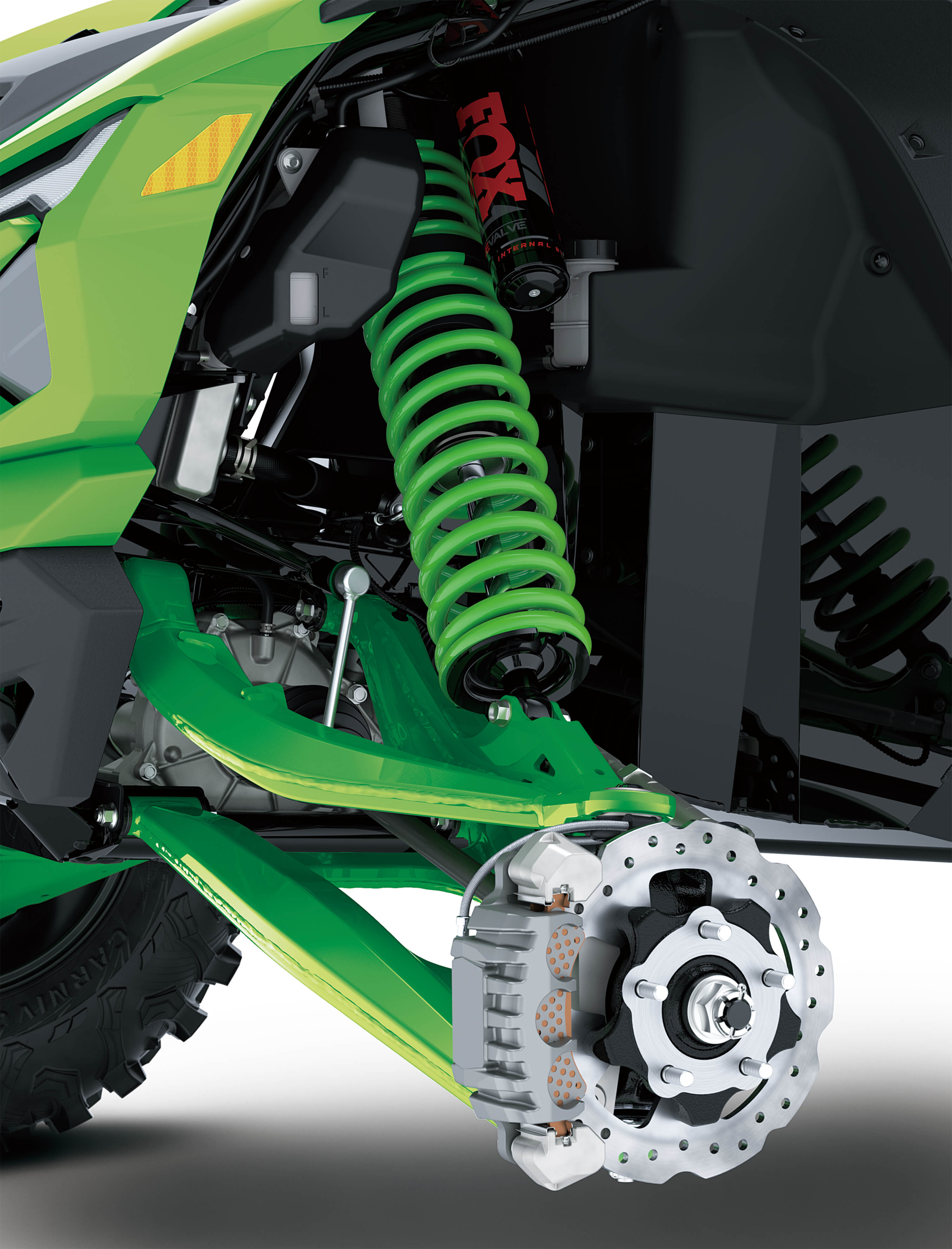 Close-up of suspension of a side x side in a white studio background.