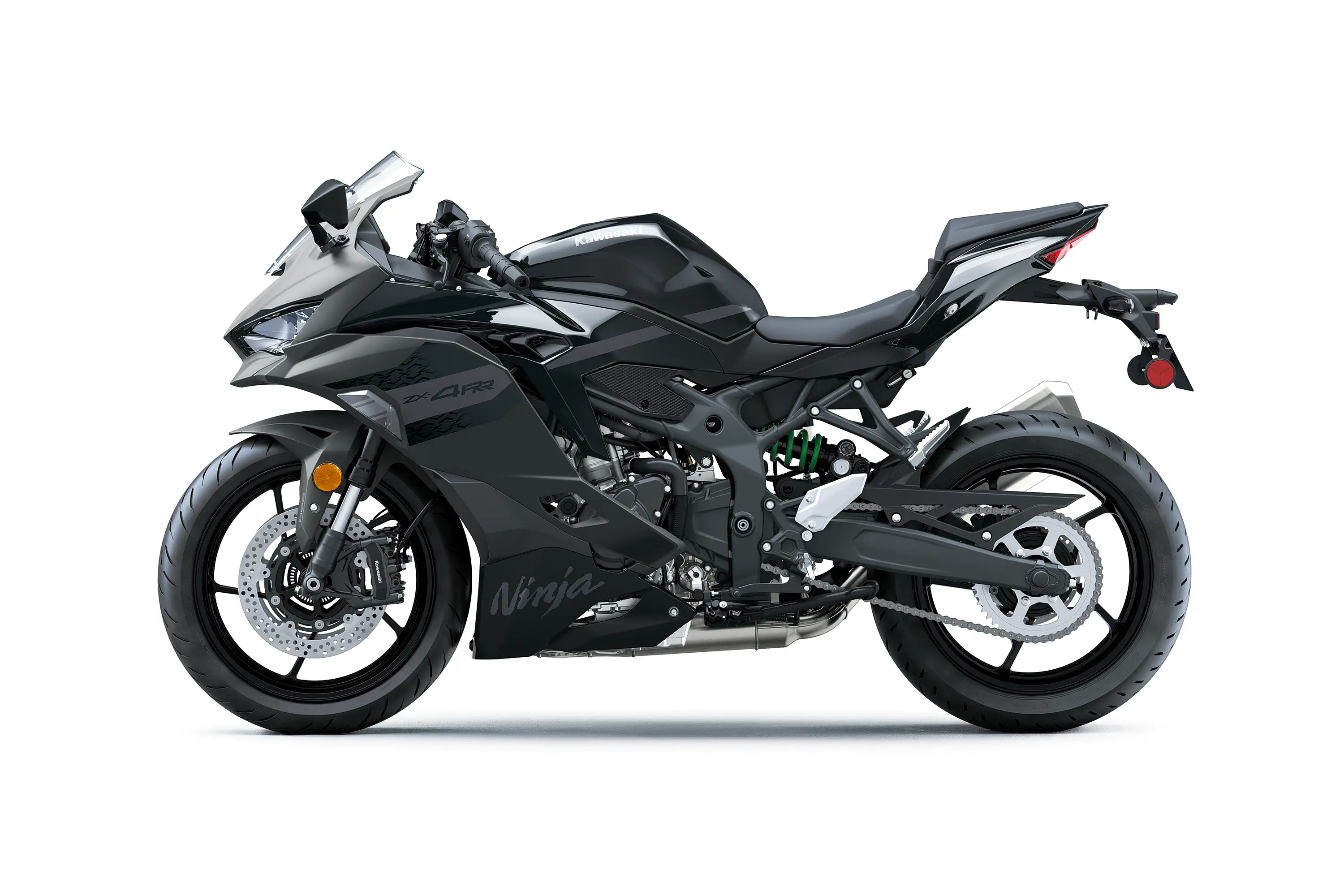 Side angle of a black motorcycle staged in a white studio background.