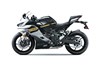 Profile angle of a black motorcycle staged in a white studio background.
