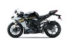 Side angle of a motorcycle staged in a white studio background.