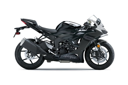 Profile angle of a black motorcycle staged in a white studio background. opens in a new window