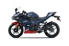 Side angle of a blue motorcycle staged in a white studio background.