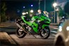 Side view of a motorcycle parked in the street.