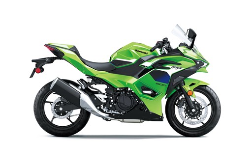 Profile angle of a green motorcycle staged in a white studio background. opens in a new window
