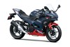 Three-quarter front angle of a blue motorcycle staged in a white studio background.