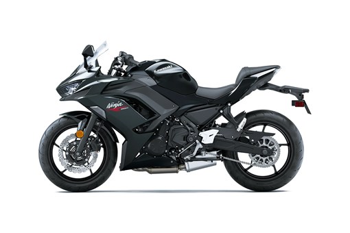 Profile angle of a black motorcycle staged in a white studio background. opens in a new window
