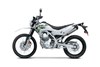 Side angle of a white motorcycle staged in a white studio background.