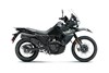 Side angle of a motorcycle staged in a white studio background.