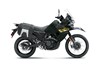 Profile angle of a black motorcycle staged in a white studio background.