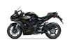Profile angle of a motorcycle staged in a white studio background.