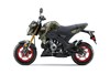 Profile angle of a motorcycle staged in a white studio background