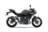 Side angle of a motorcycle staged in a white studio background.