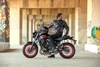Side angle of a motorcycle parked.