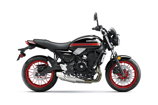 Side angle of a motorcycle staged in a white studio background. opens in a new window