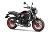 Three-quarter front angle of a motorcycle staged in a white studio background.