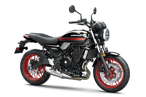 Three-quarter front angle of a motorcycle staged in a white studio background. opens in a new window