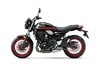 Profile angle of a motorcycle staged in a white studio background.