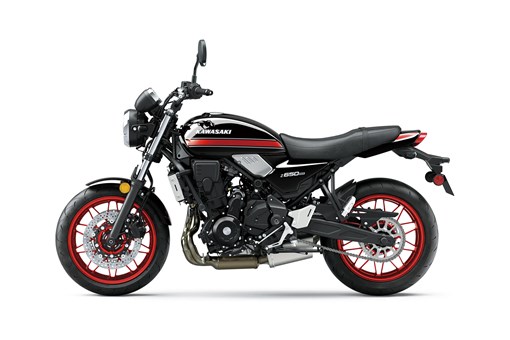Profile angle of a motorcycle staged in a white studio background. opens in a new window