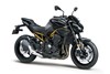 Three-quarter front angle of a motorcycle staged in a white studio background.