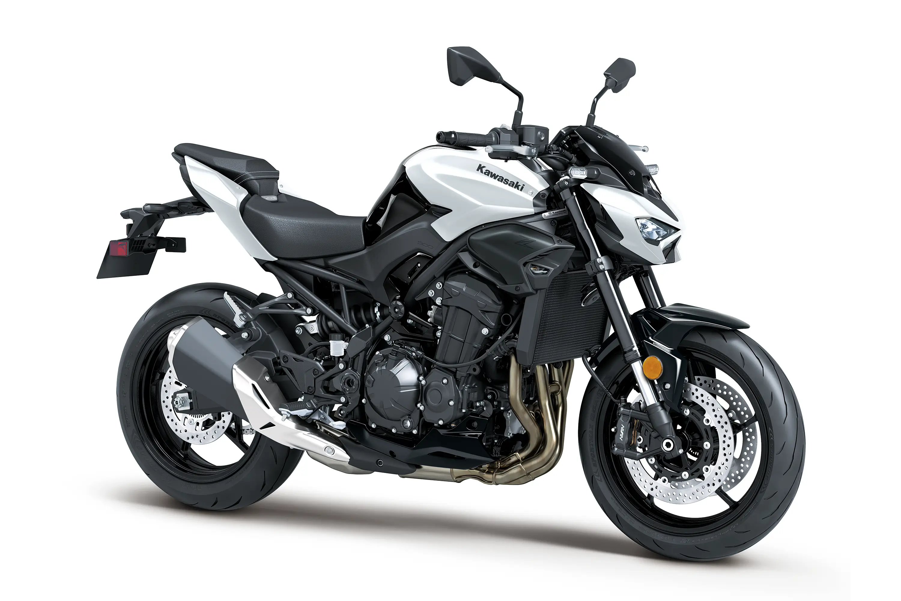 Three-quarter front angle of a motorcycle with white accents staged in a white studio background.