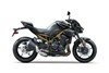 Side angle of a motorcycle staged in a white studio background.