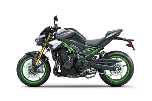 Profile angle of a motorcycle staged in a white studio background. opens in a new window