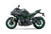 Profile angle of a motorcycle staged in a white studio background.