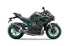 Side angle of a motorcycle staged in a white studio background.