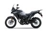 Profile angle of a motorcycle staged in a white studio background.