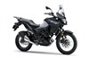 Three-quarter front angle of a motorcycle staged in a white studio background.