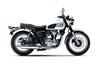 Side angle of a motorcycle staged in a white studio background.