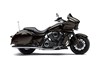 Side angle of a motorcycle staged in a white studio background.