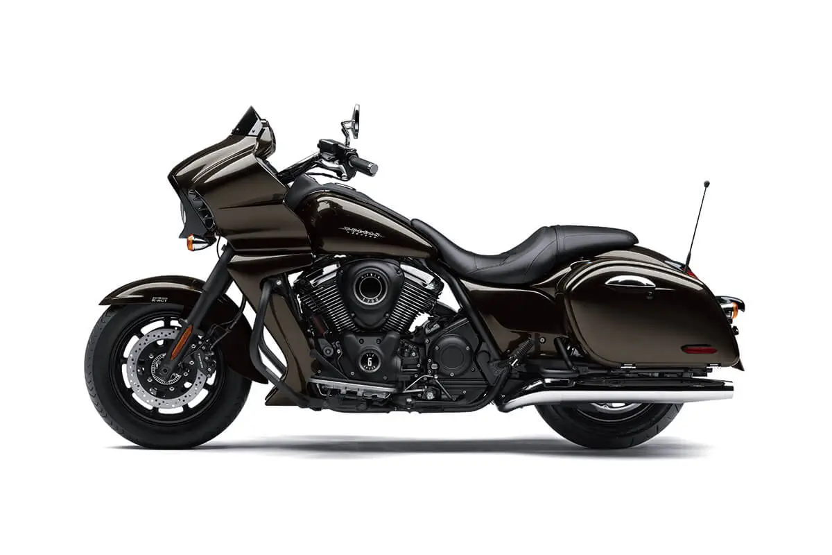 Profile angle of a motorcycle staged in a white studio background.