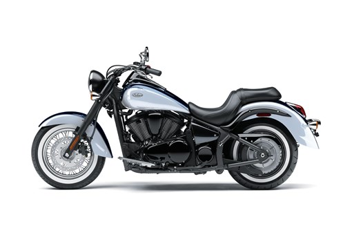 Profile angle of a motorcycle staged in a white studio background. opens in a new window