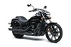 Three-quarter front angle of a motorcycle staged in a white studio background.