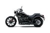 Profile angle of a motorcycle staged in a white studio background.