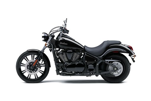 Profile angle of a motorcycle staged in a white studio background. opens in a new window