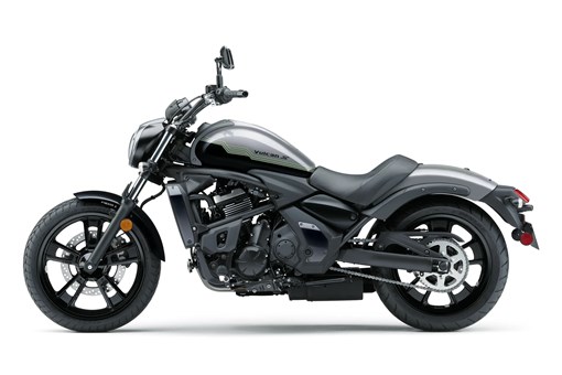 Profile angle of a motorcycle staged in a white studio background. opens in a new window