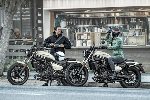 Side angle of two motorcycles parked. opens in a new window
