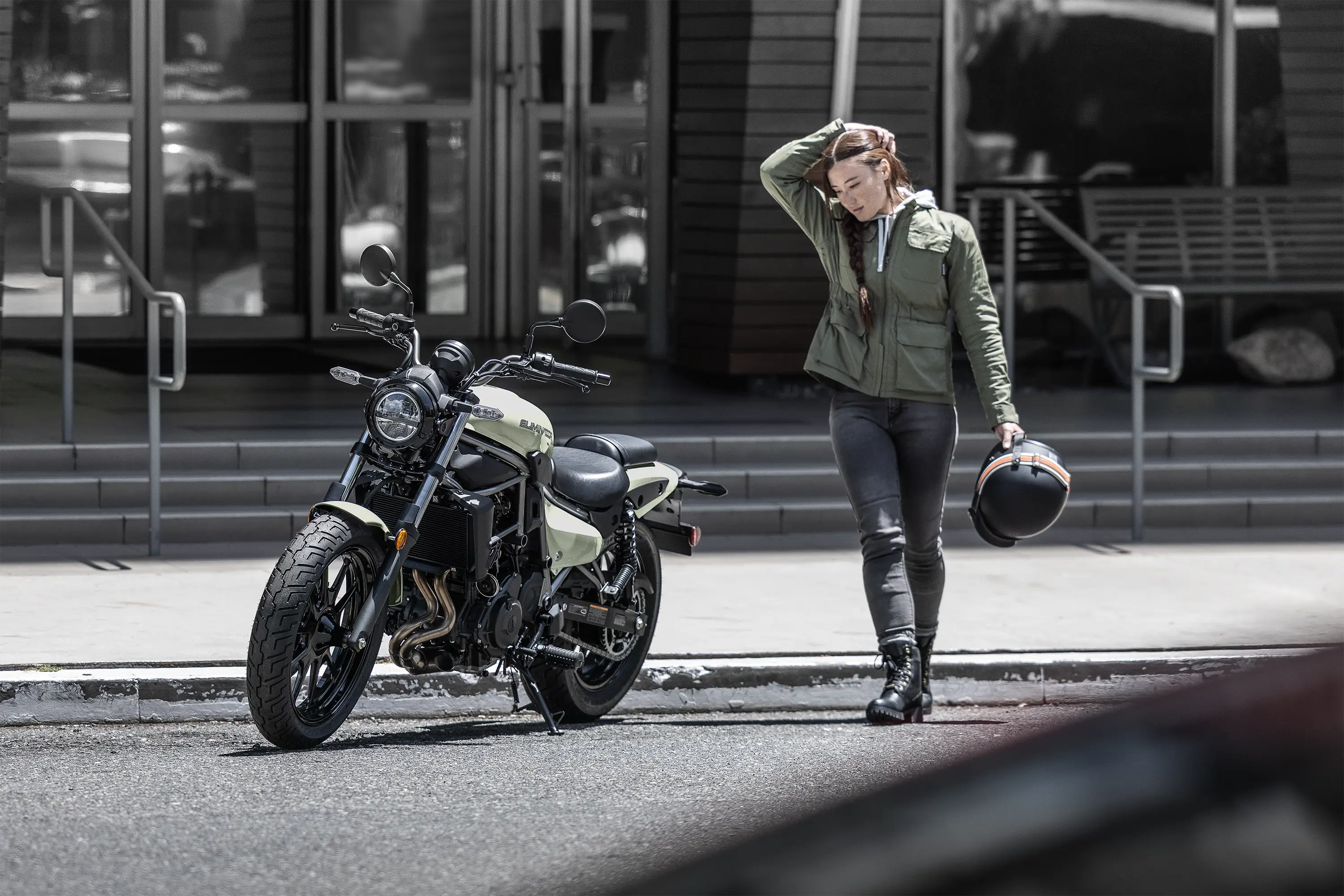 Three-quarter front angle of a motorcycle parked.