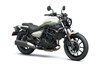 Three-quarter front angle of a motorcycle staged in a white studio background.