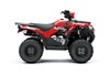 Side angle of a red ATV staged in a white studio background.