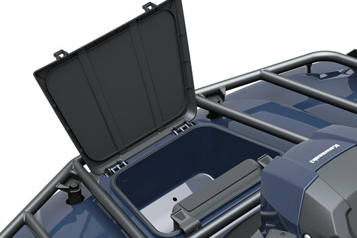Closeup detail of storage compartment of an ATV staged in a white studio background. opens in a new window