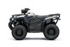 Side angle of an ATV staged in a white studio background.