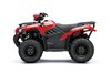 Side angle of a red ATV staged in a white studio background.