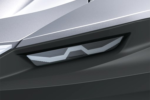 Closeup headlight angle of a personal watercraft staged in a white studio background. opens in a new window