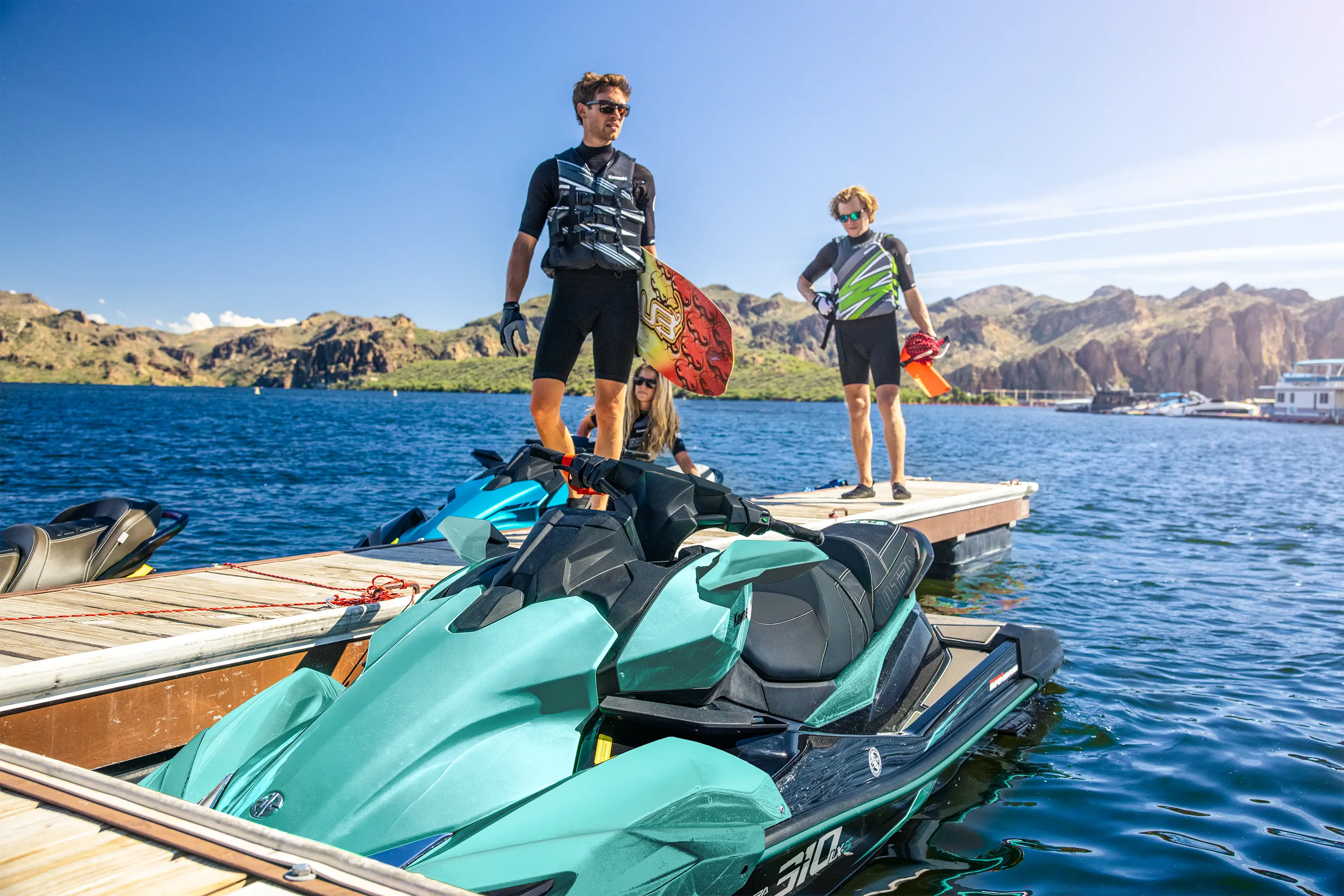 Front angle of a personal watercraft parked on the water.