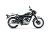 Profile angle of a motorcycle staged in a white studio background.